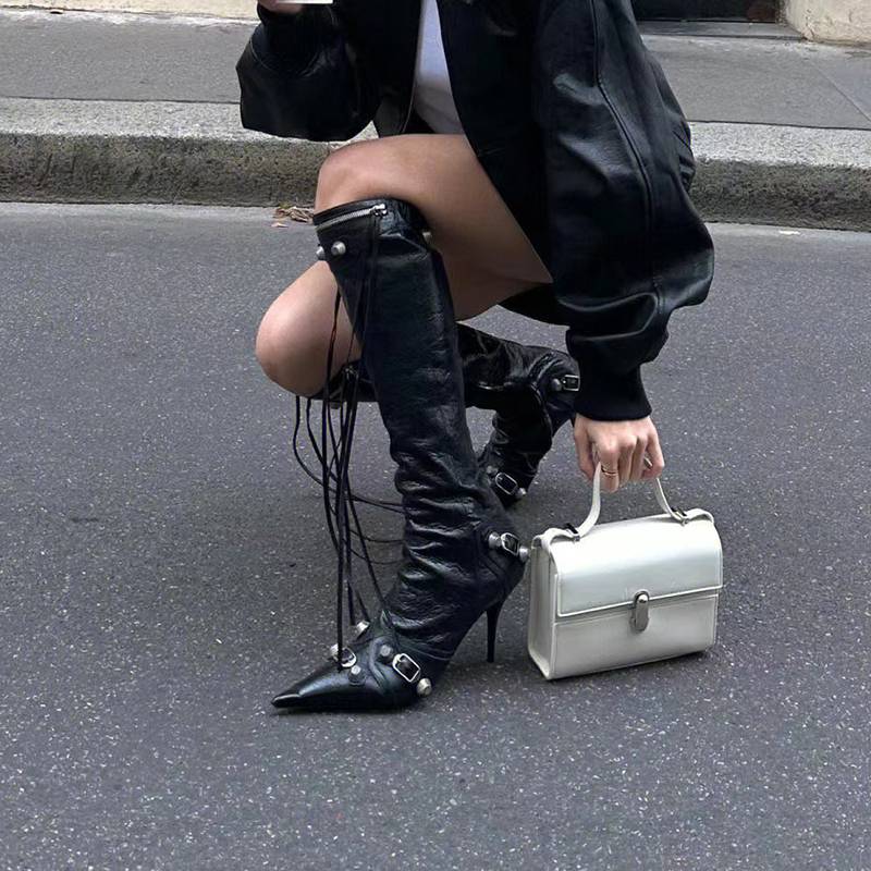 Polarized rivet boots 23 new European and American thin -heeled girl high -heeled motorcycle boots zipper 7cm fashion high boots
