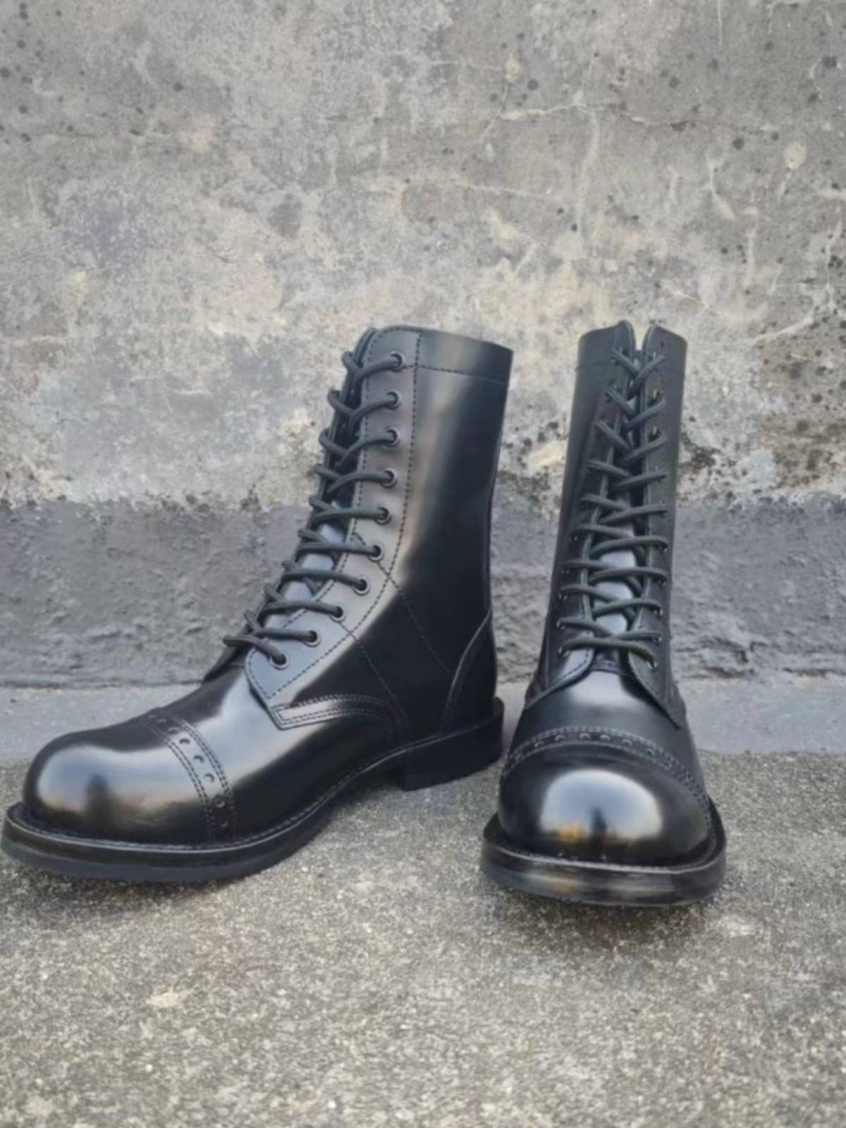 Martin Boots Boy Springs and Autumn's new one with a man's boots on a motorcycle