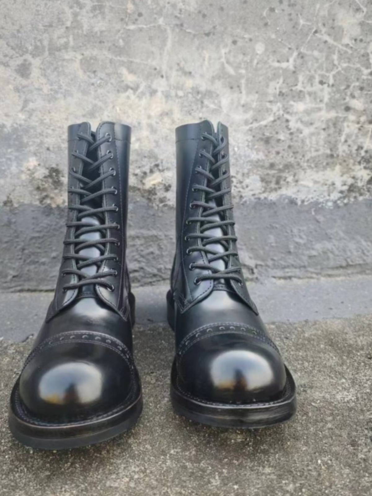 Martin Boots Boy Springs and Autumn's new one with a man's boots on a motorcycle