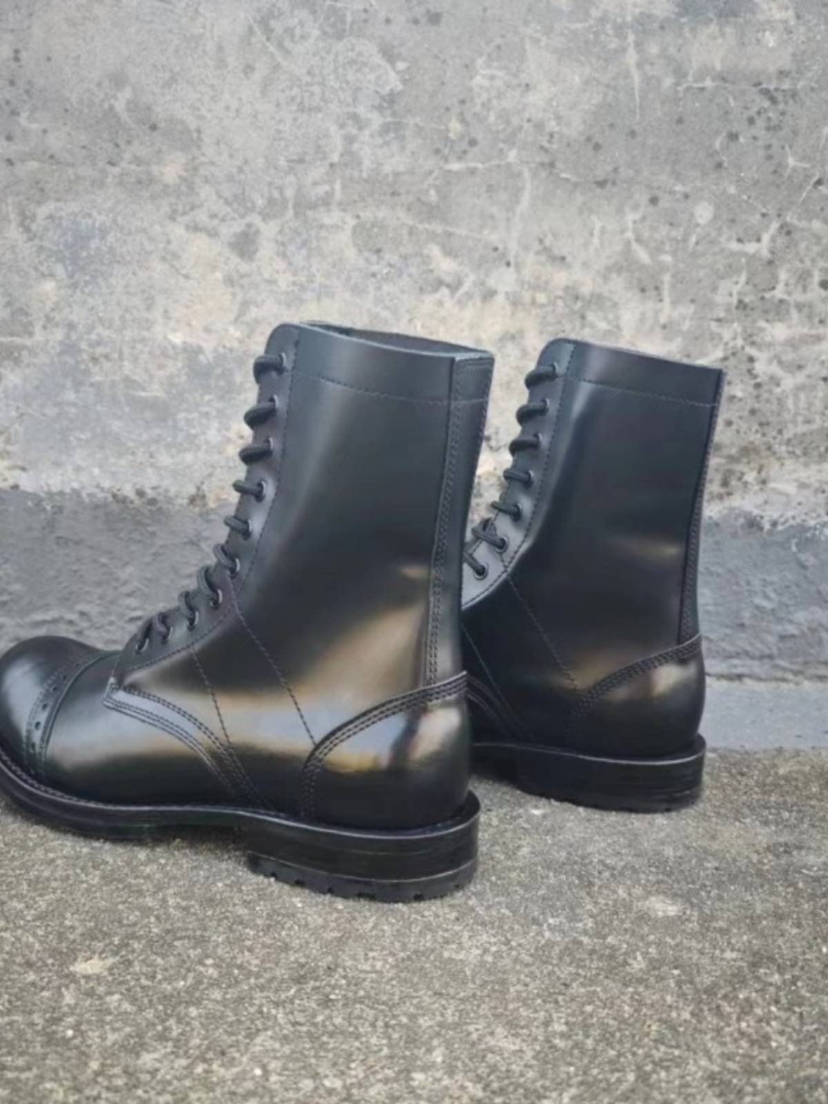 Martin Boots Boy Springs and Autumn's new one with a man's boots on a motorcycle