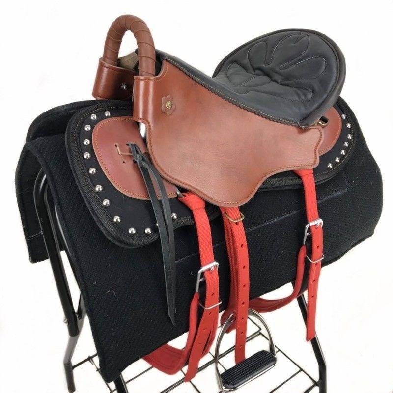 The green leather large red saddles