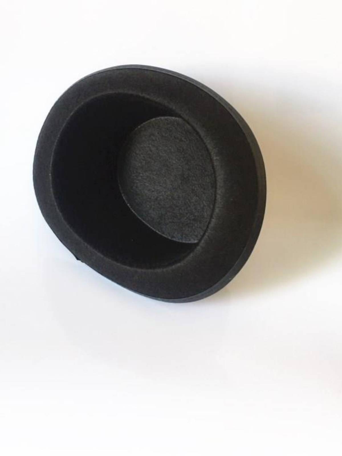The magic man's hat, Lincoln's hat, black hat, and a 6-1-year-old kid dressed for Christmas