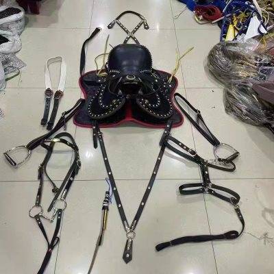 Horse saddles full of saddle cushions