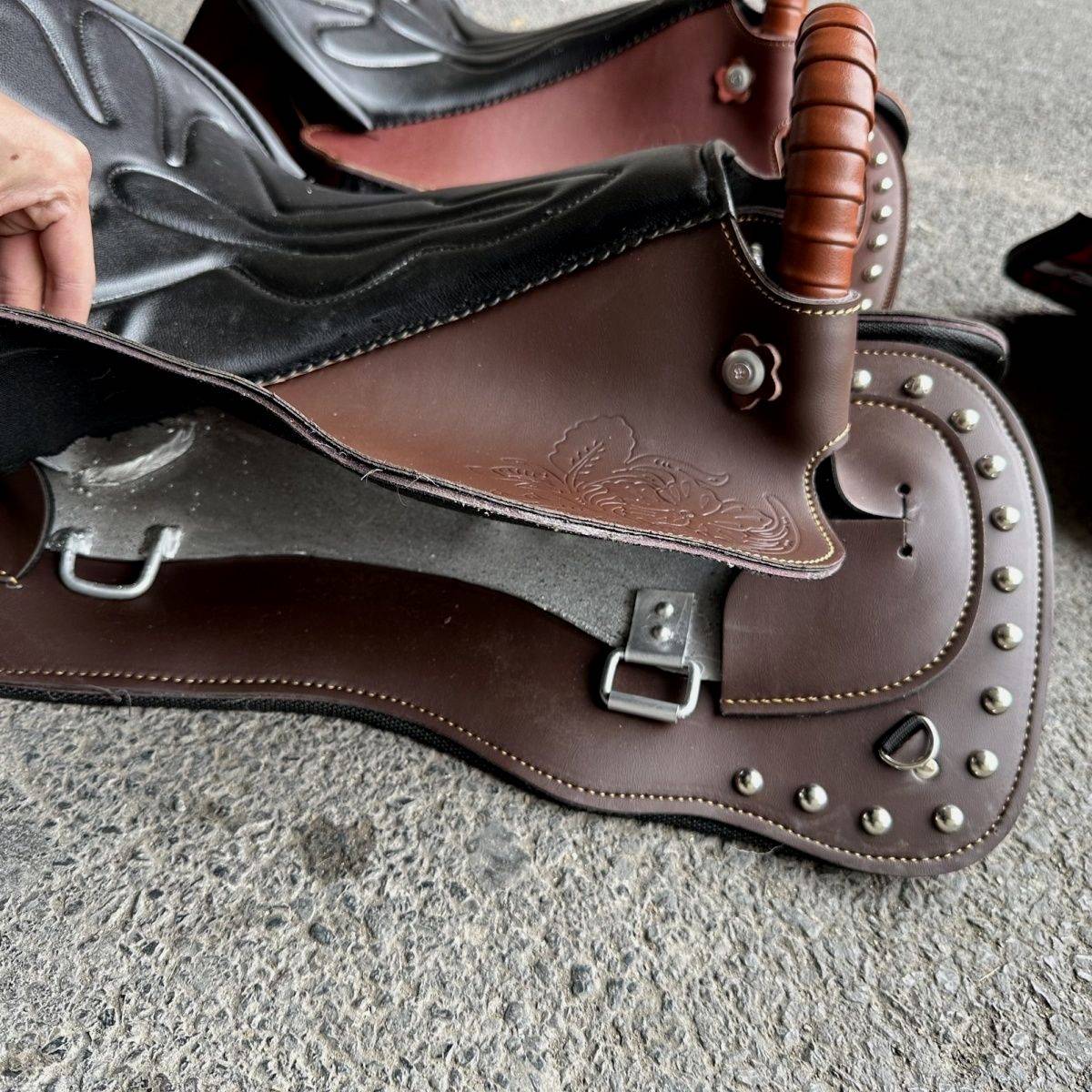 The saddle's full of new cow-skin saddles for the Western Horse tourists