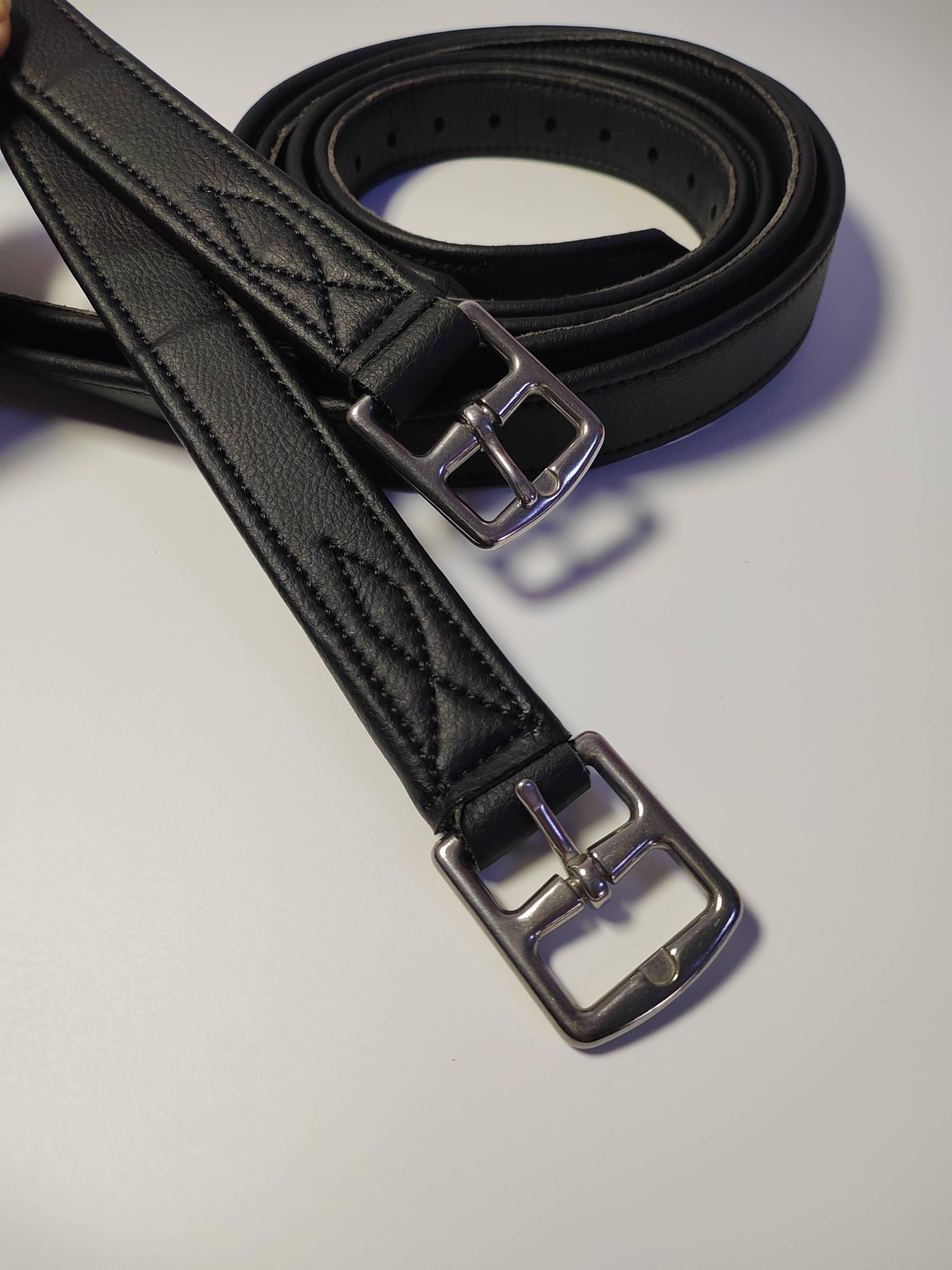 Super-skin ponys with a leg graft and an English saddle