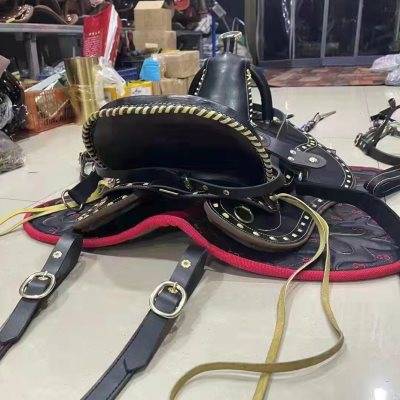 Horse saddles full of saddle cushions