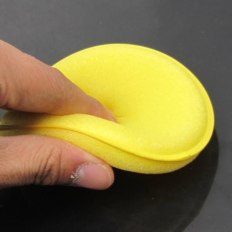 Cleaning leather goods rubbing the sofa seat leather bag clothes jacket shoes, wax, polishing care maintenance, sponge