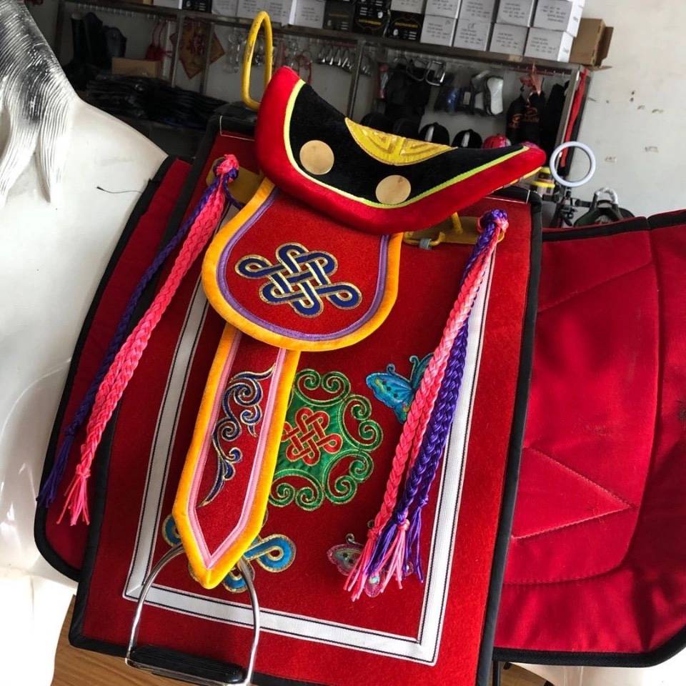 Red camel saddle