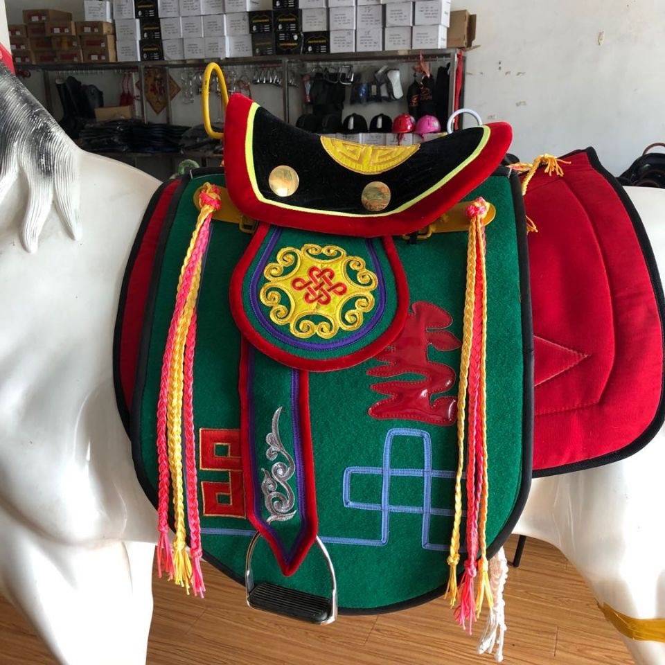 Green camel saddle