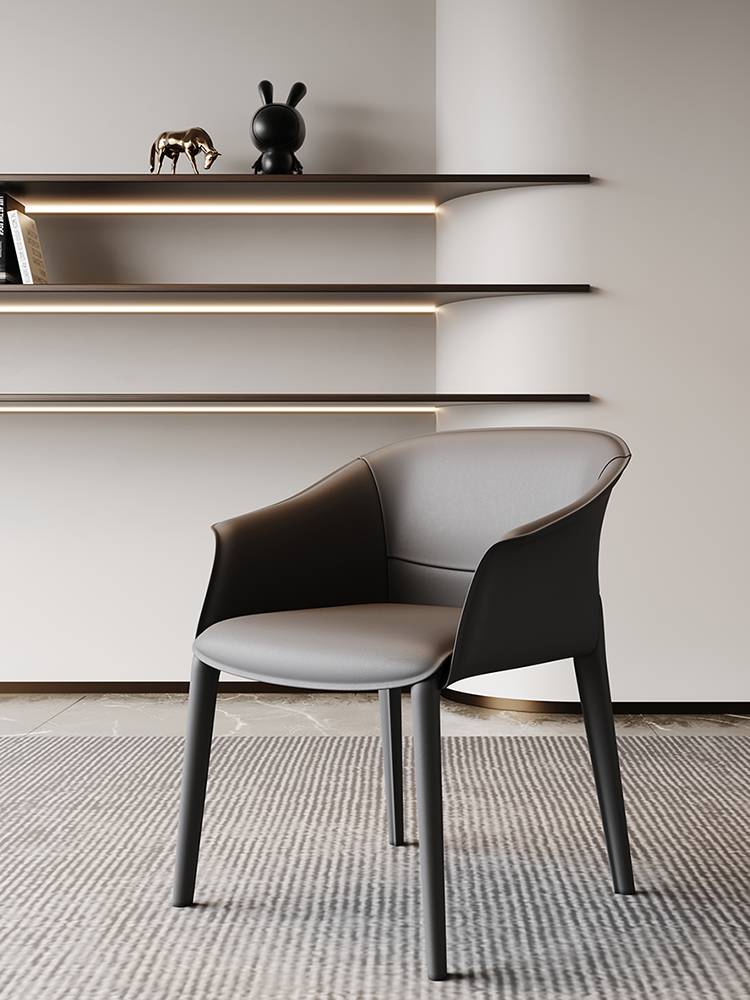 The saddle-covered chair home uses a modern, simple tea chair, a light luxurious armchair, a very simple designer's library chair