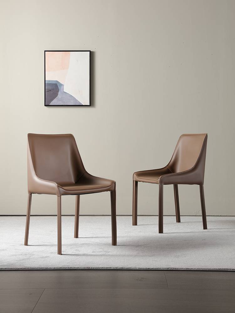 A saddle-skin-stool home with a stool for a stool for a light-luxe industrial wind designer and a desk and chair for a very simple hotel restaurant