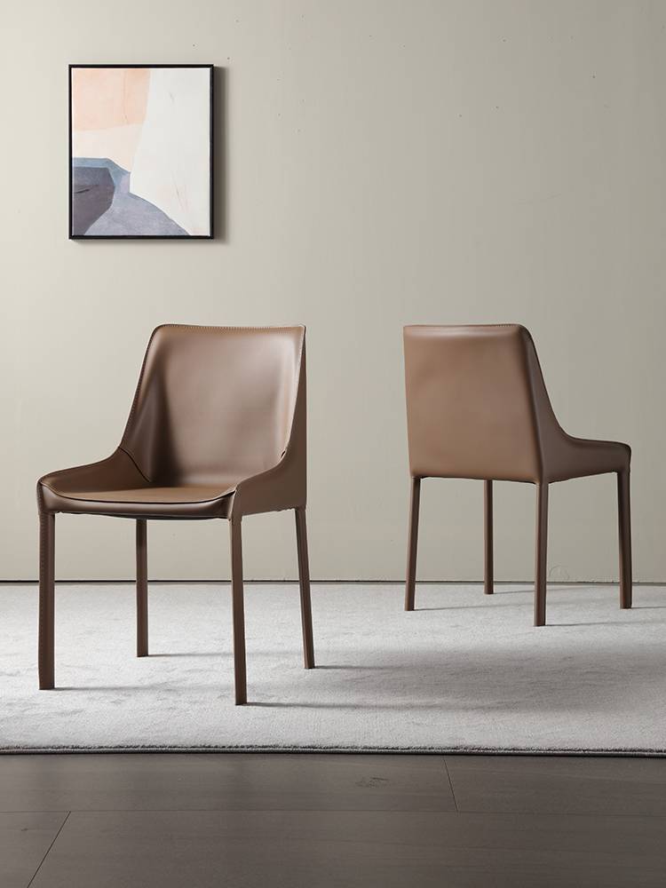 A saddle-skin-stool home with a stool for a stool for a light-luxe industrial wind designer and a desk and chair for a very simple hotel restaurant