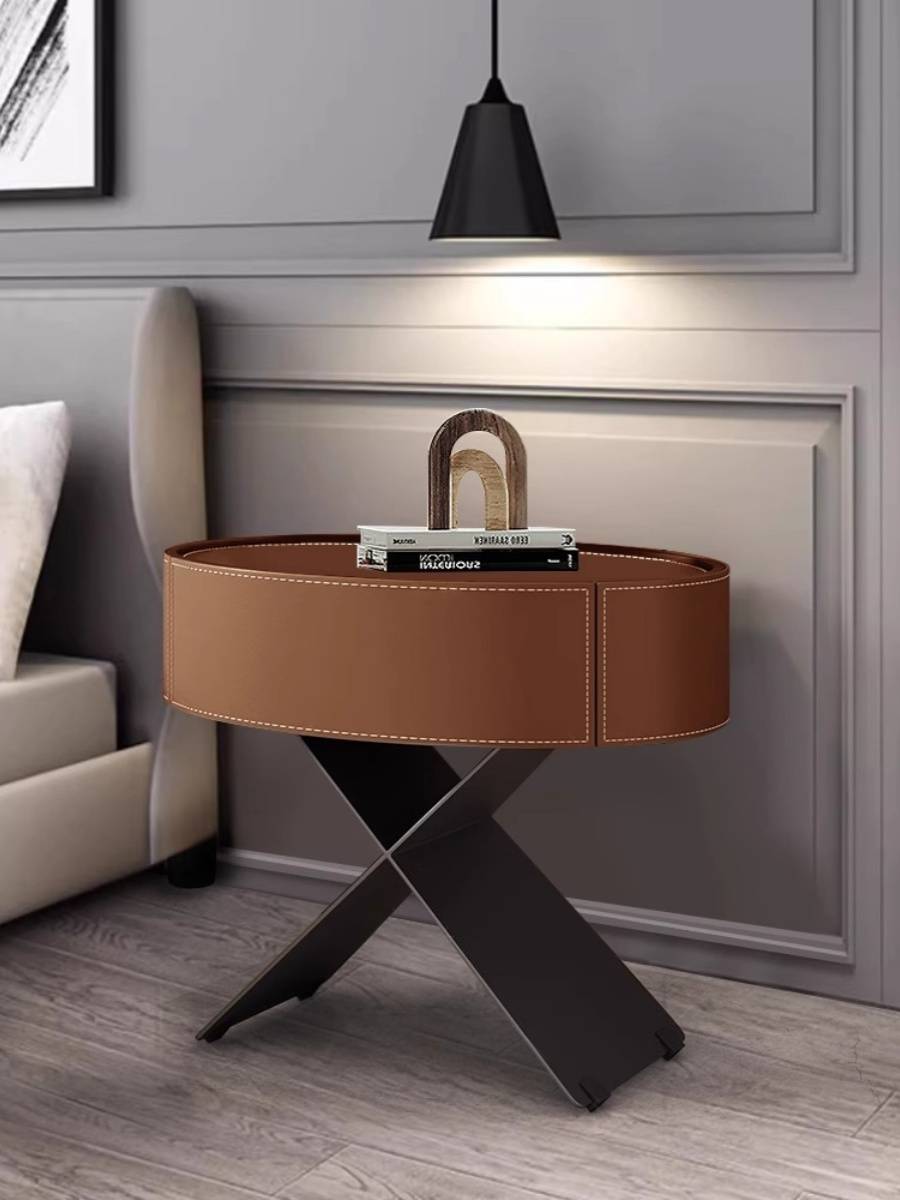 Italian minimalist horse saddling bedside cabinet modern bedroom Creative oval bedside storage cabinet light luxury high -level sensor side cabinet