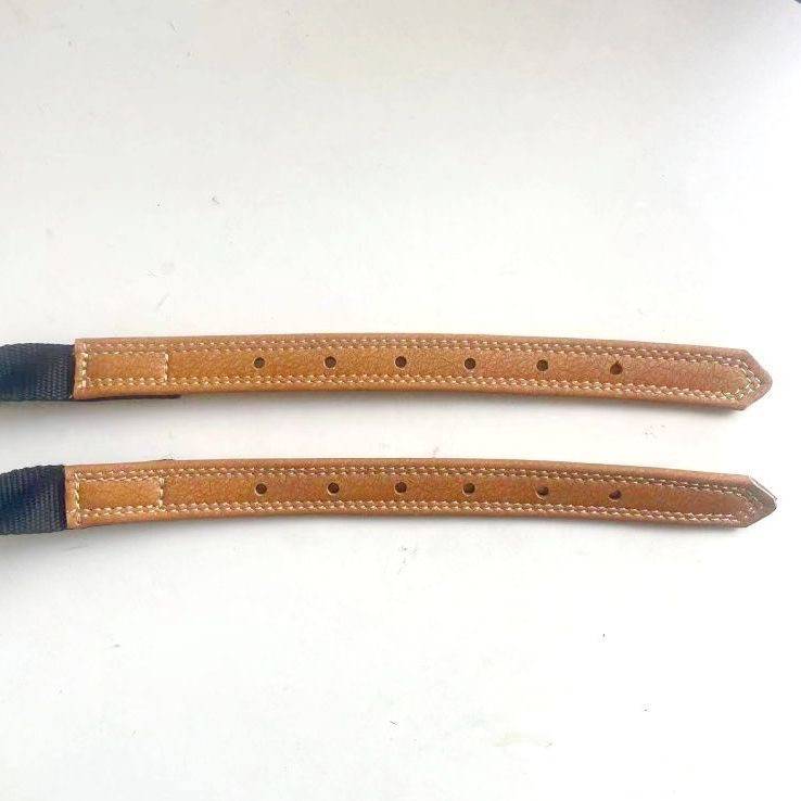 A saddle with a horse's belly plate, a horse's body