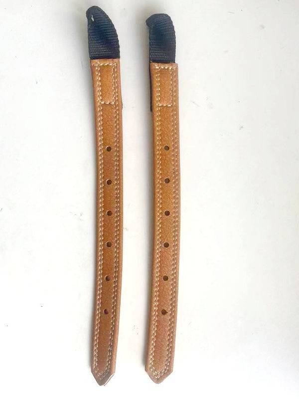A saddle with a horse's belly plate, a horse's body