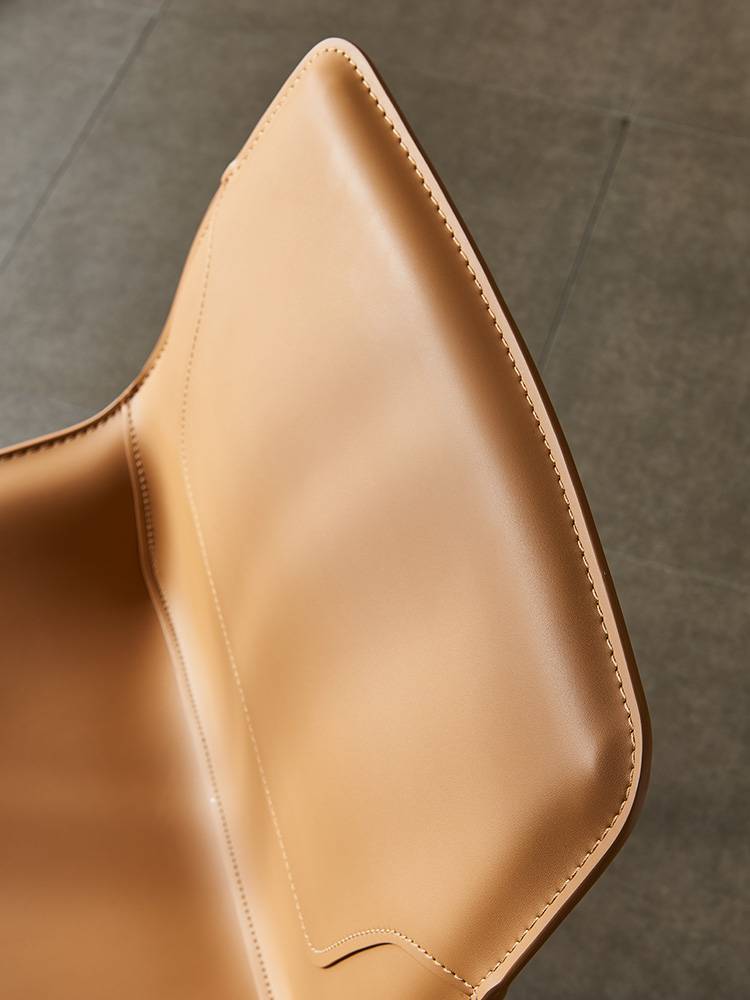 Nordic light luxury saddle leather dining chair home modern minimalist back dining chair Italian minimalist designer leather chair