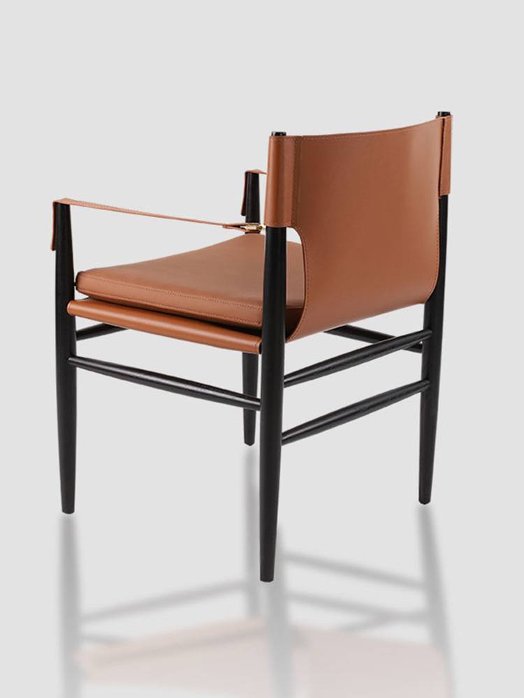 Nordic light luxury designer dining chair high -level sense of silence, minimalist, high -end black walnut solid wood saddle chair