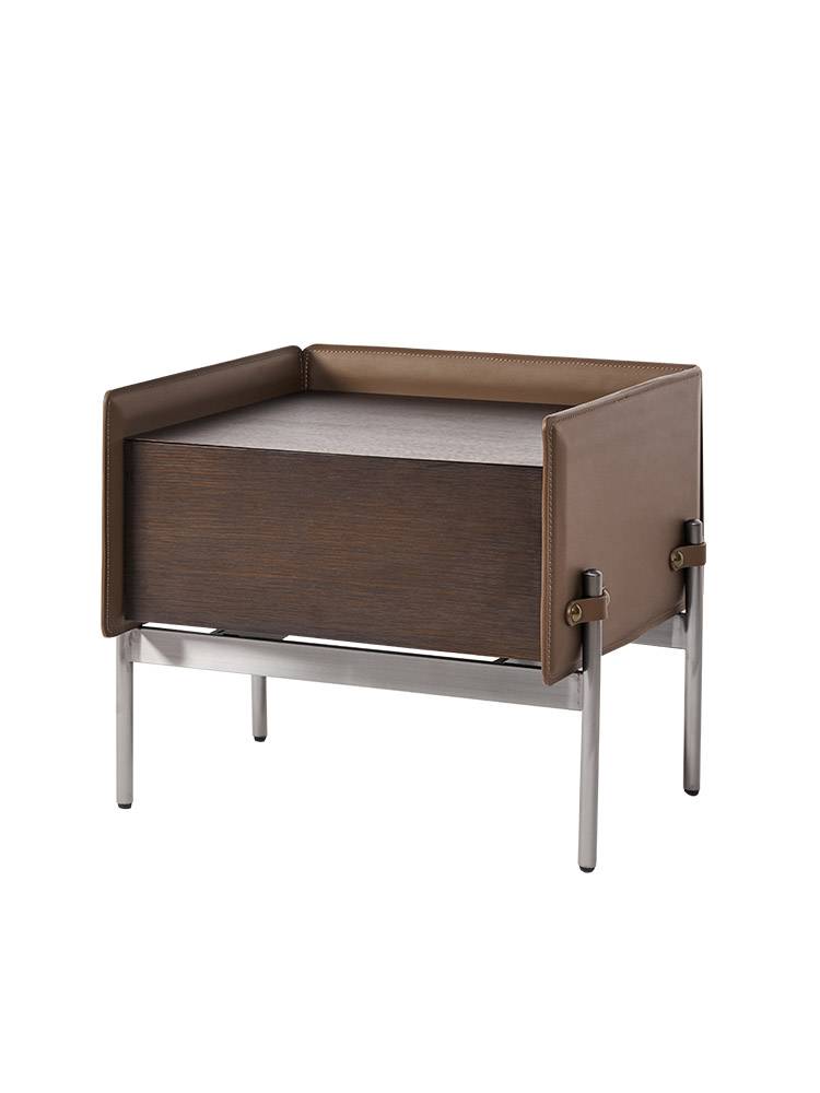 Aston Martin's very simple saddle-covered, modern, simple bedside cabinet for the master designer
