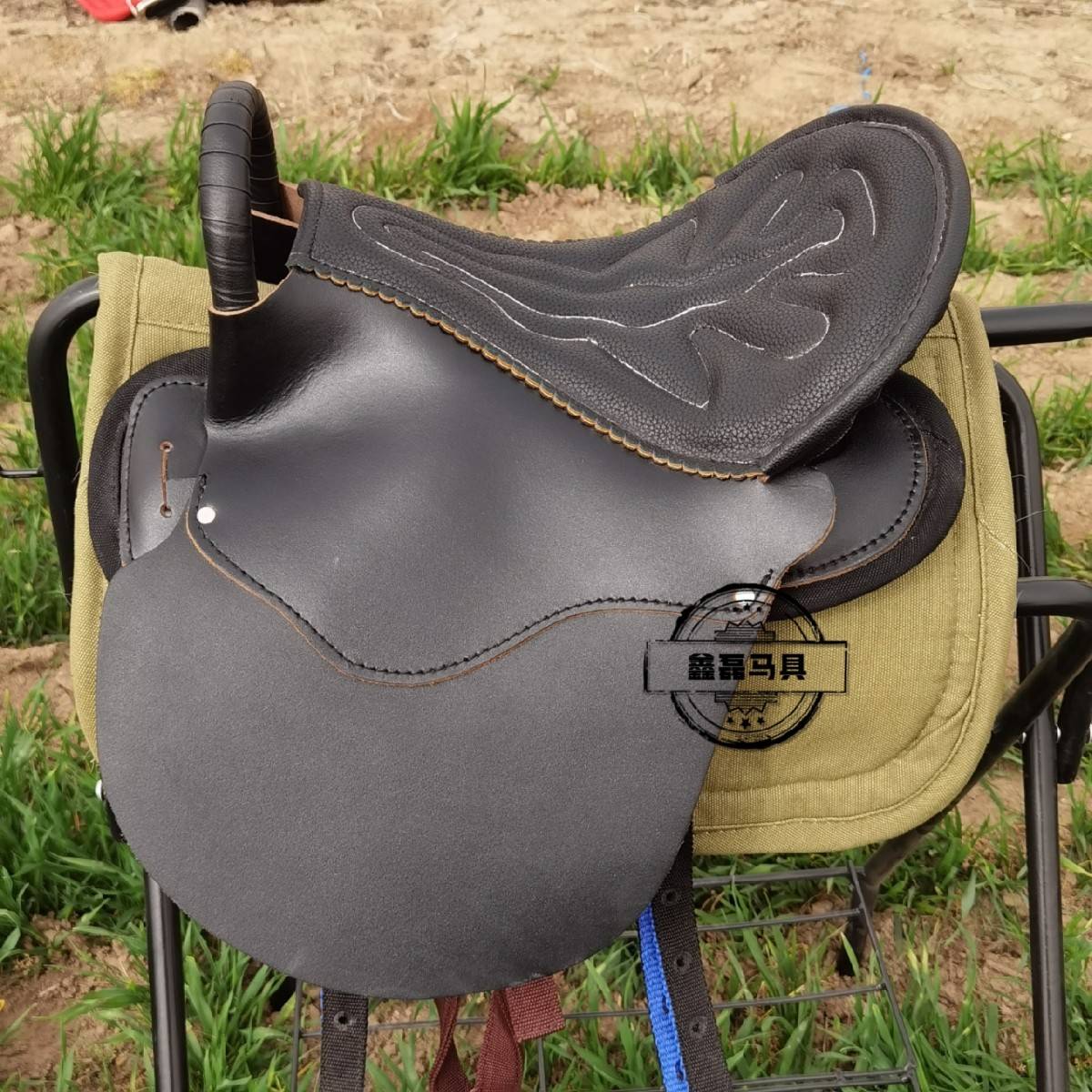 The saddle's full, the saddle's utensils, the new cow's-skin-a-dumper's saddle, the horse's horse's supplies, the mail