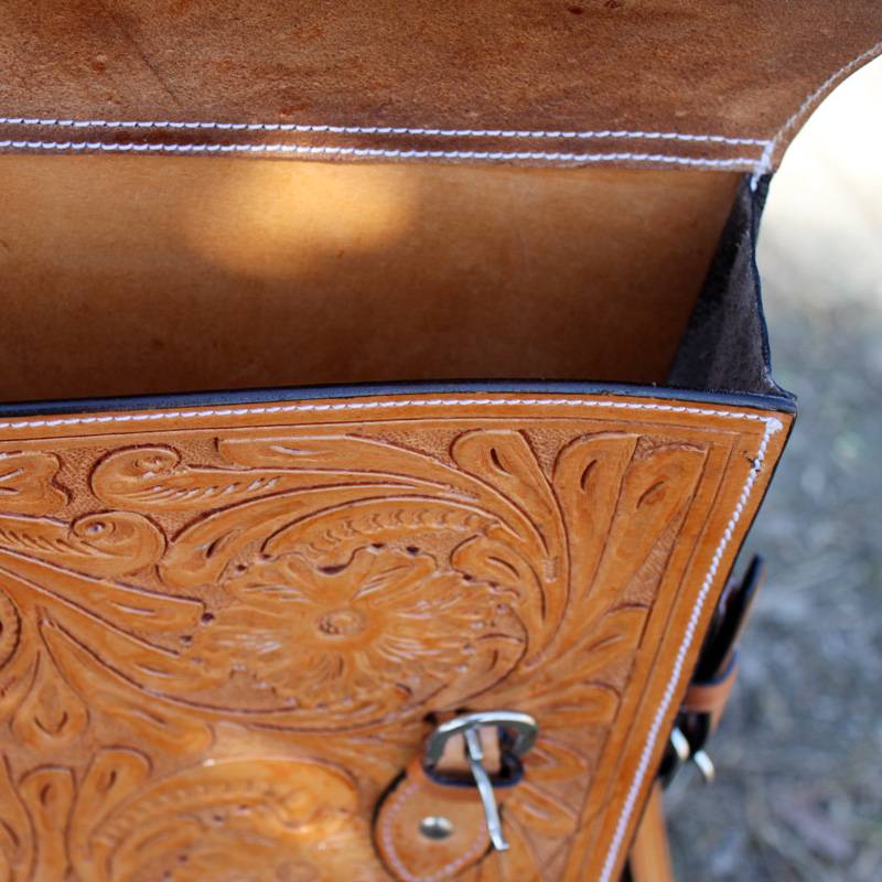 A horse-skin on a saddle bag, a knight with eight feet of horse gear