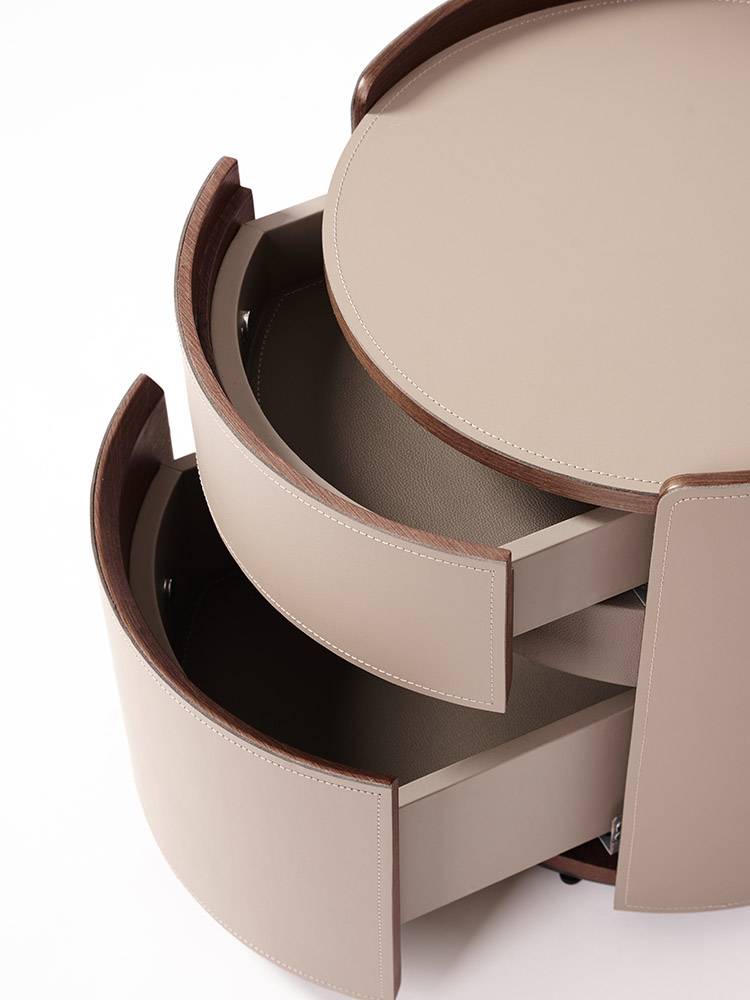 Simple minimalist LTALIAN designer saddles round bedside bedroom bedroom high -end storage storage bedside cabinet