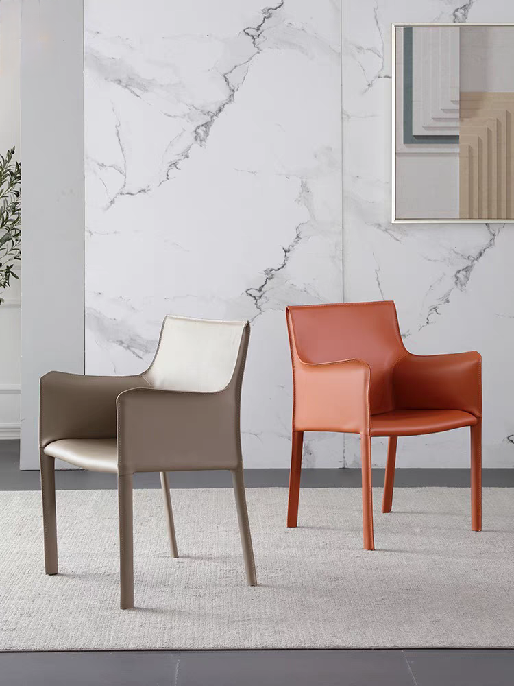 The saddle-skin chair, the Nordic light luxurious designer's chair, the advanced sense of the book table and the chair are very simple by the backside
