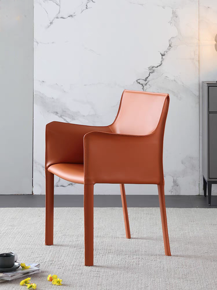 The saddle-skin chair, the Nordic light luxurious designer's chair, the advanced sense of the book table and the chair are very simple by the backside