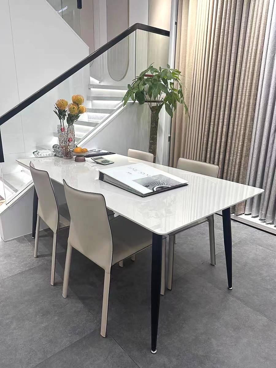 Italian minimalist saddling dining chair home light luxury high -level backdame horse saddle chair black and white modern dining table and chair