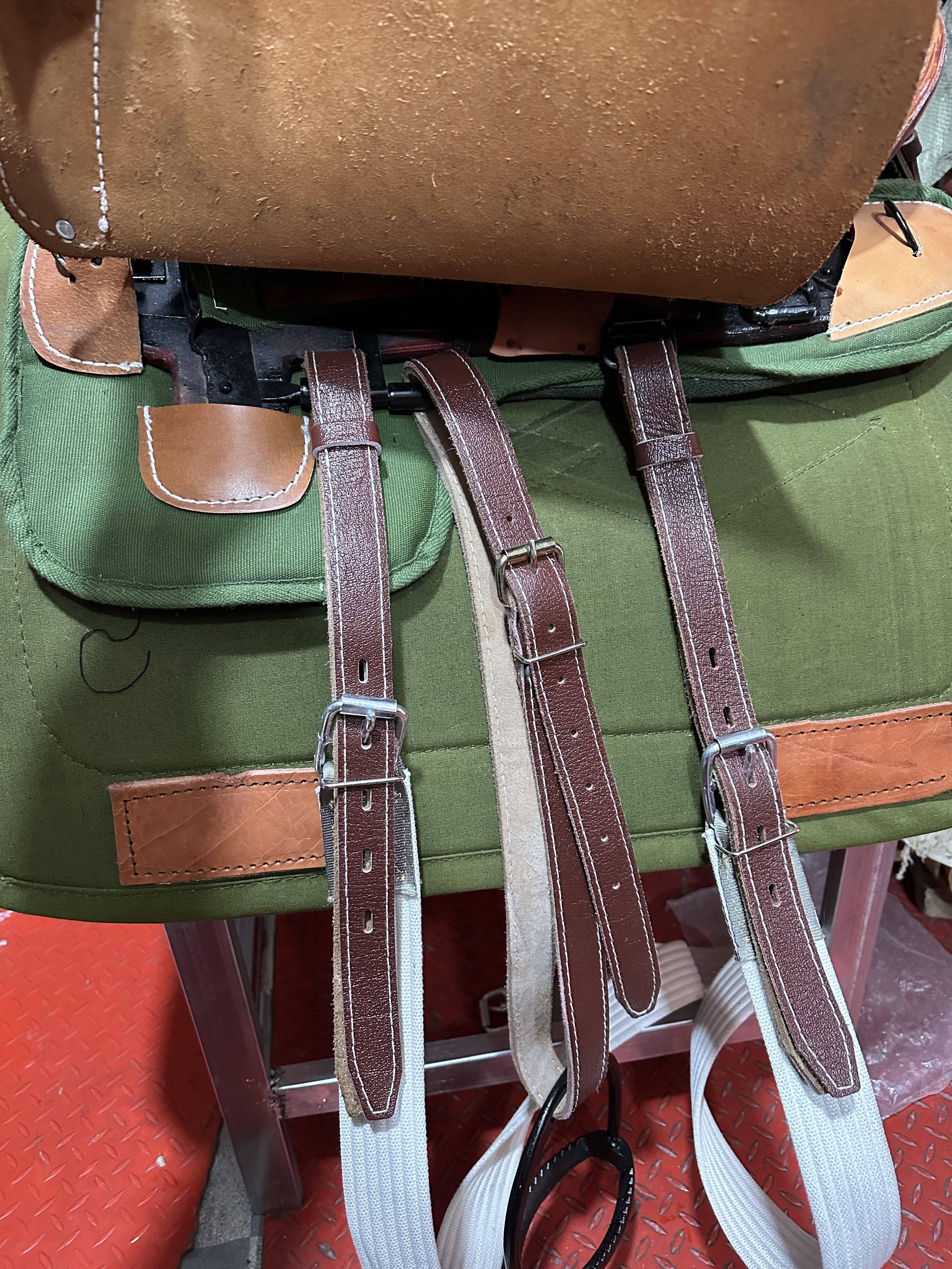 All of the cow-skin parts of the horse's horse's graft are sorely screeched with old army saddles