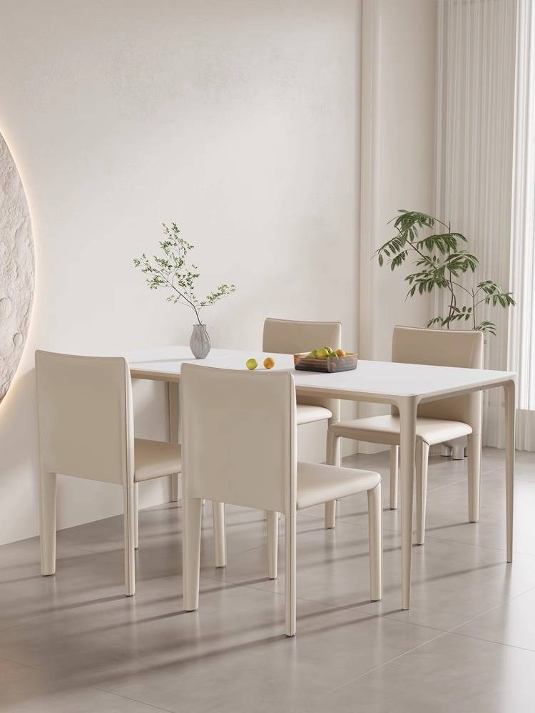 A saddle-skin-stool home with a back-seat red bench at the hotel restaurant table with a simple designer chair