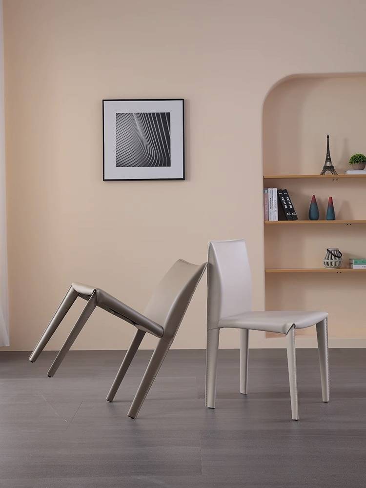 A saddle-skin-stool home with a back-seat red bench at the hotel restaurant table with a simple designer chair