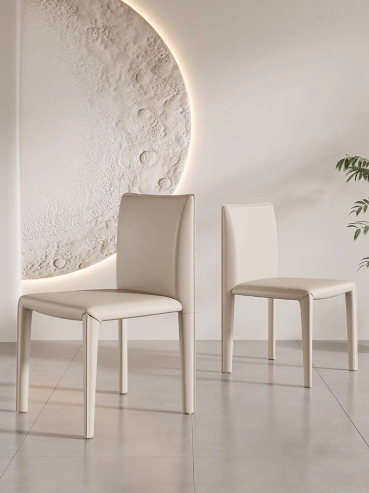 A saddle-skin-stool home with a back-seat red bench at the hotel restaurant table with a simple designer chair