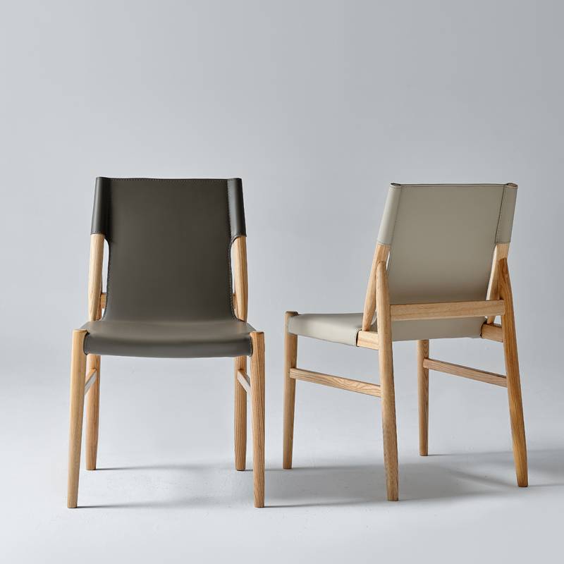 Simplified luxury saddle leather dining chair Modern master design sense original wooden chair high -end hotel meeting to negotiate solid wood chairs