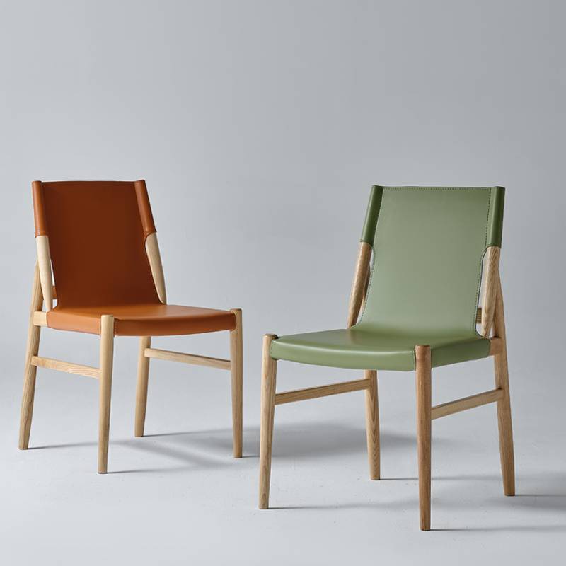 Simplified luxury saddle leather dining chair Modern master design sense original wooden chair high -end hotel meeting to negotiate solid wood chairs