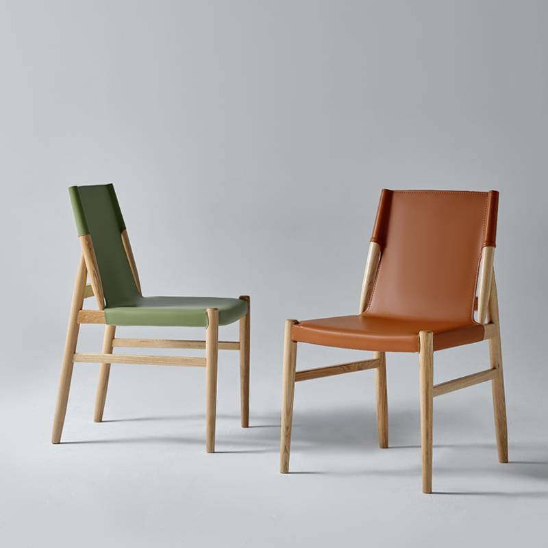 Simplified luxury saddle leather dining chair Modern master design sense original wooden chair high -end hotel meeting to negotiate solid wood chairs