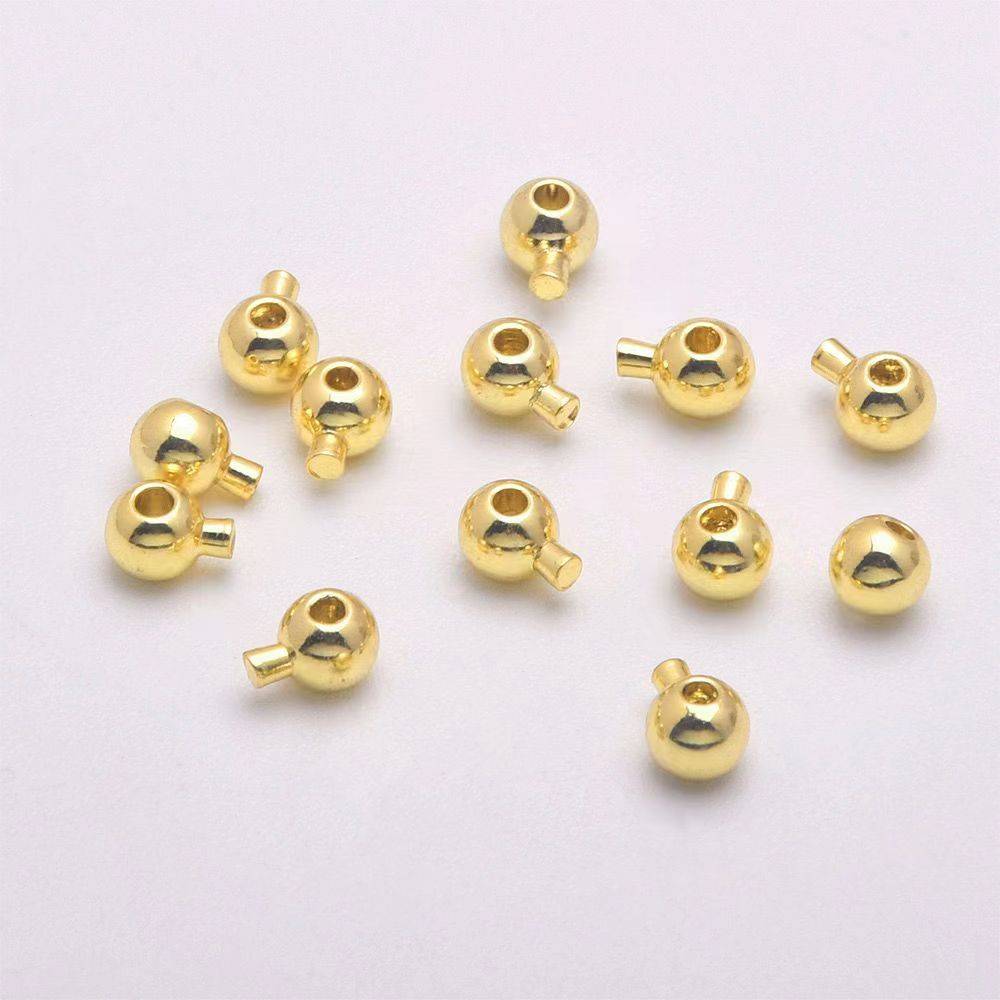 18K GOLD ROUND, 10