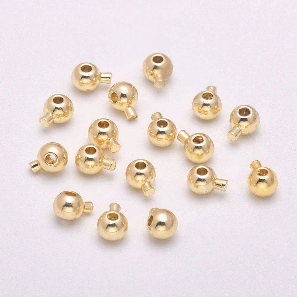 18K GOLD ROUND, 20