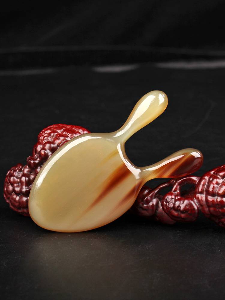 White water horn little snail nose massage device Eye face, face, face, beam and ear tools, eyes, gluten ribs scraper artifact