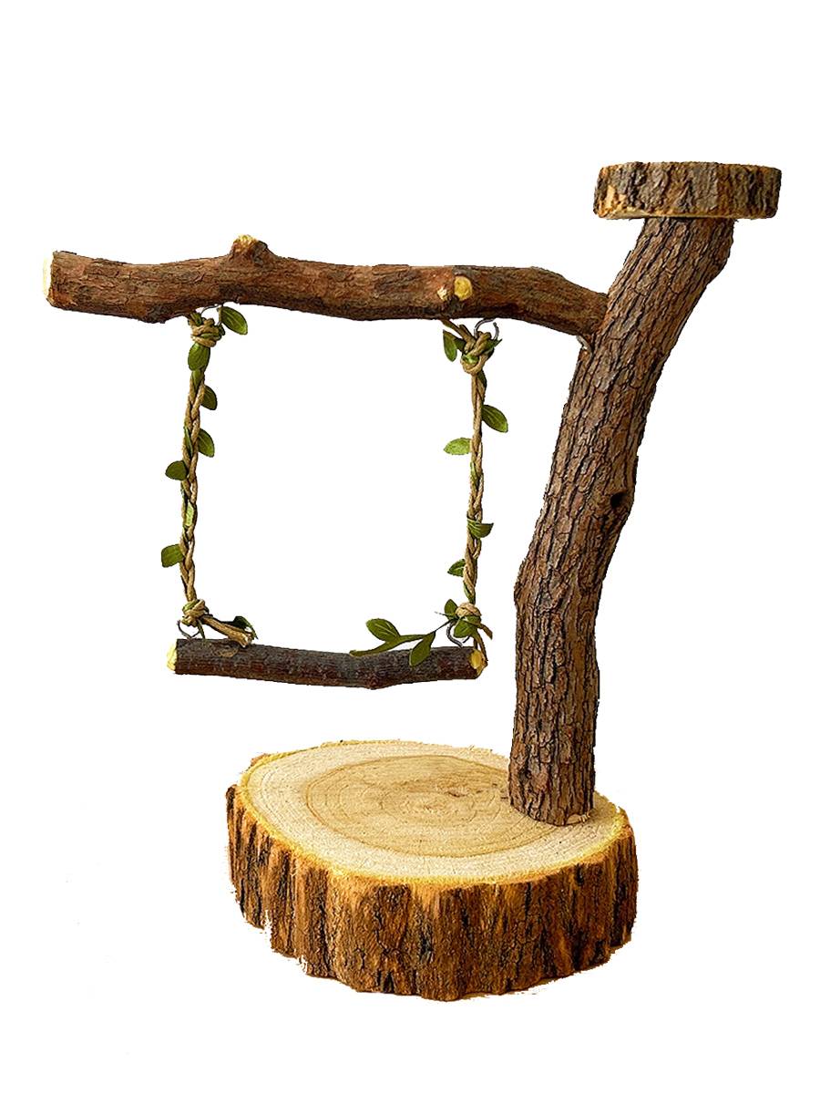 A bird station with a real tree and a parrot with a bird's troupe