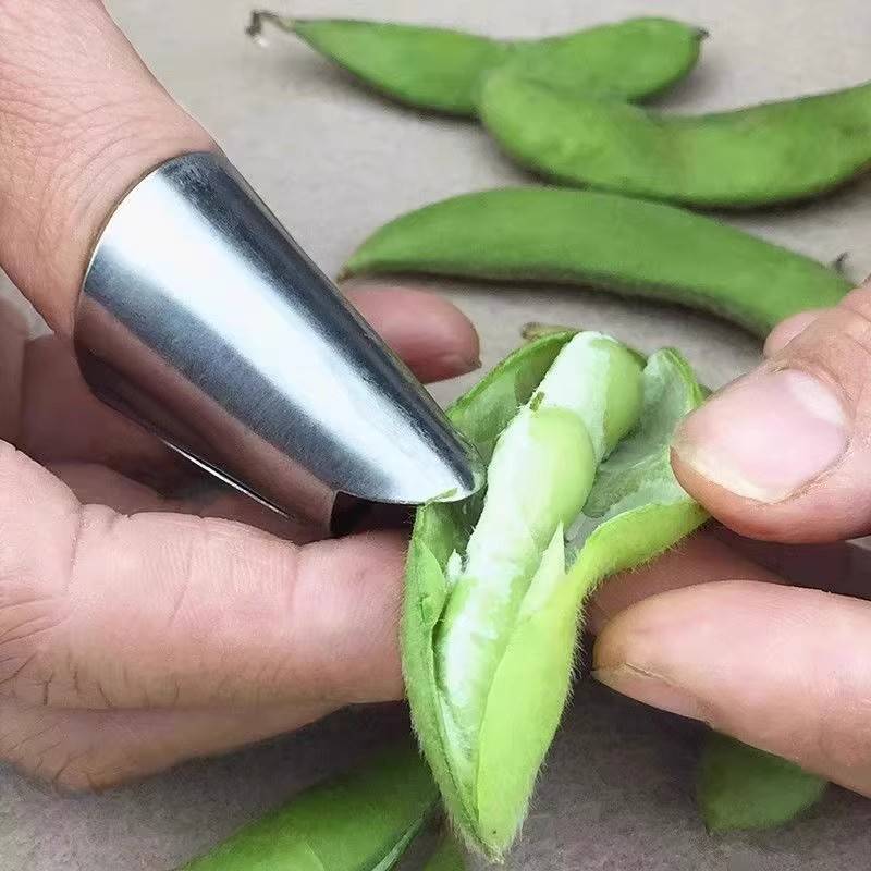 Stainless steel picking artifact nail nail finger protective sleeve finger sleeve peeling garlic and hair bean thumb knife