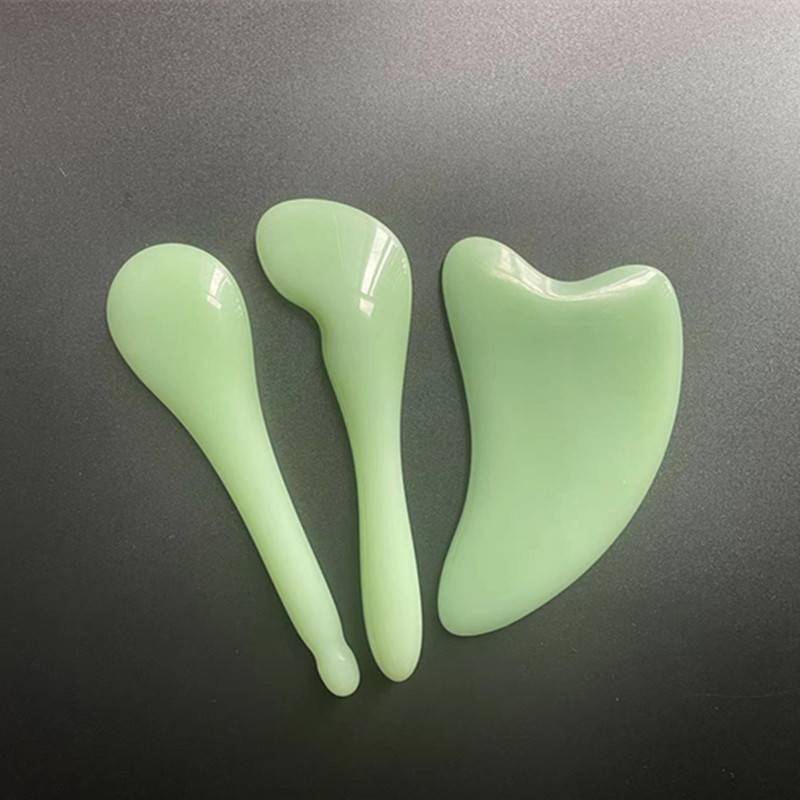 Two pairs of green jade thick + green jade dolphins