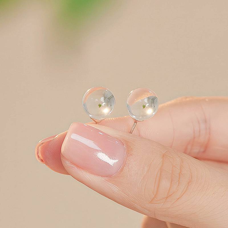 Natural white crystal small ball earrings small and simple, simple transport bead ear decoration female nourishing ear piercing cold, light pure lunar earrings gift