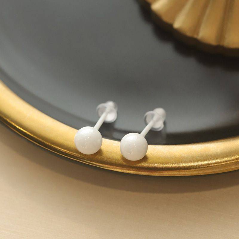 Ceramic ear nails - a white pair