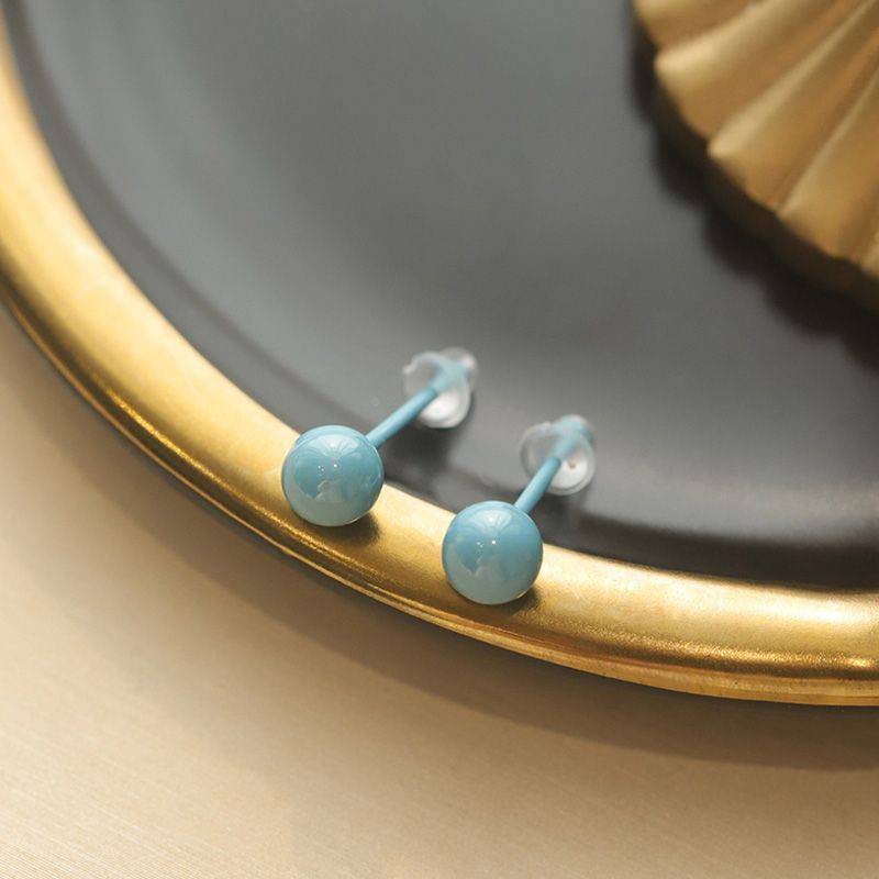 Ceramic ear nails. Blue pair