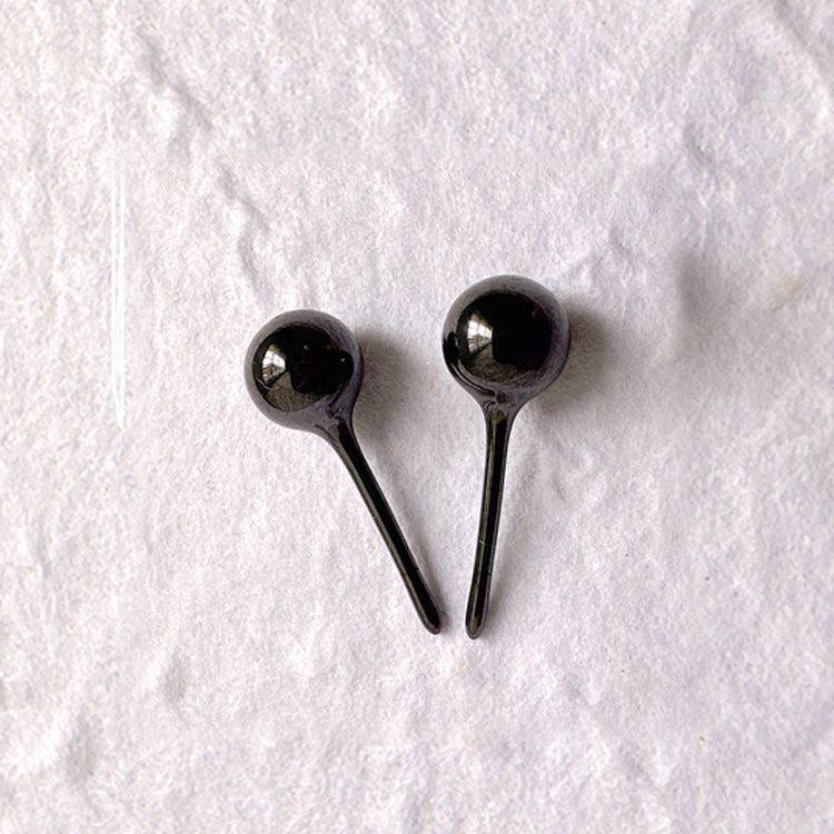Ceramic ear nails. Black pair