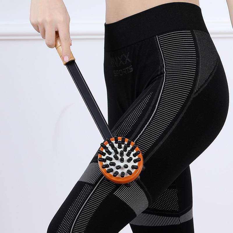 Hand -holding backmaker knocking massage hammer wooden meridian massage rod to beat neck shoulder back hammer shoulder fitness