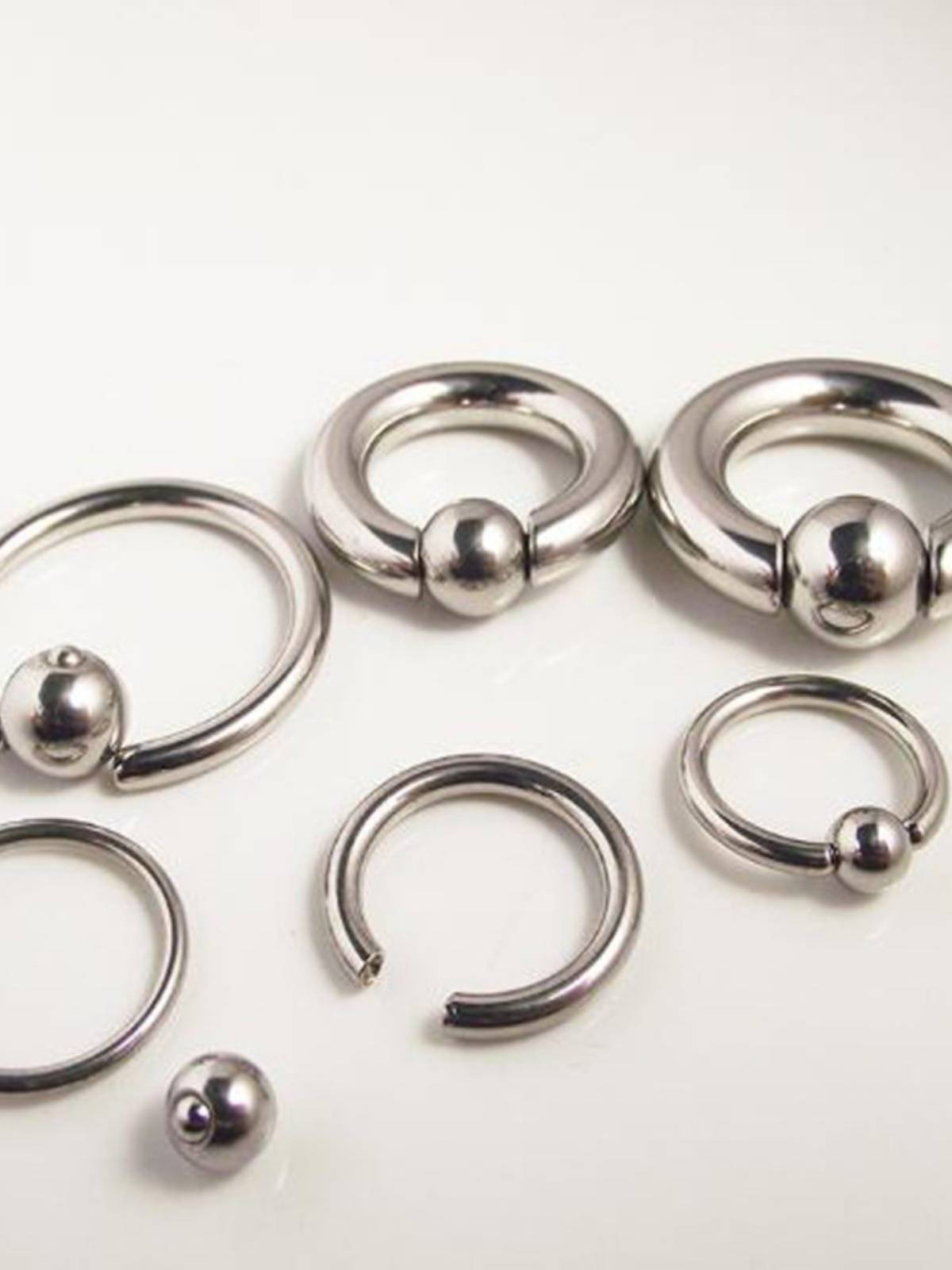ALLERGIE-PROOF TITANIUM STAINLESS STEEL BCR LARGE-SIZED CARP BALL-RINGED EARRING RING, MOST OFTEN RING PA RING