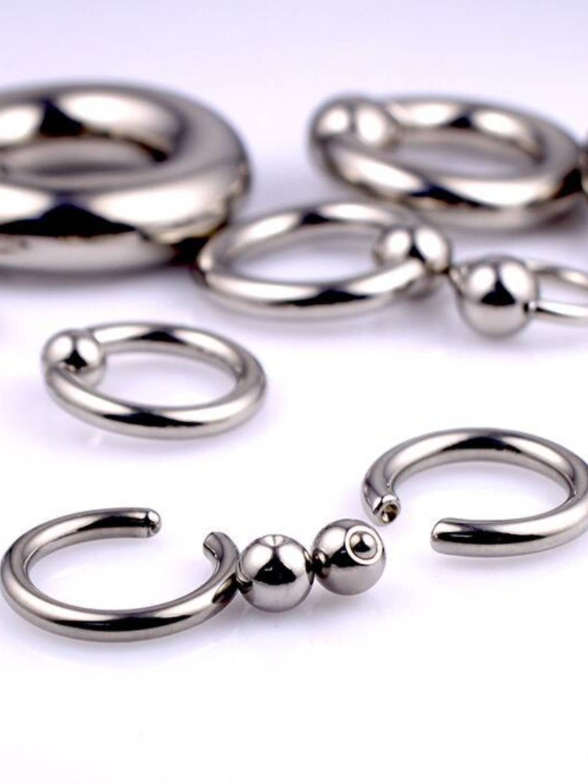 ALLERGIE-PROOF TITANIUM STAINLESS STEEL BCR LARGE-SIZED CARP BALL-RINGED EARRING RING, MOST OFTEN RING PA RING
