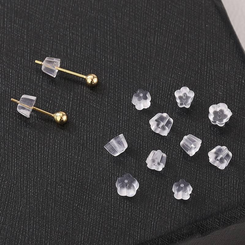 Silicone plum blossom ear blocked universal high -grade anti -skids and ear earns blocked earrings. Ear fake at earlier 2023 Ear