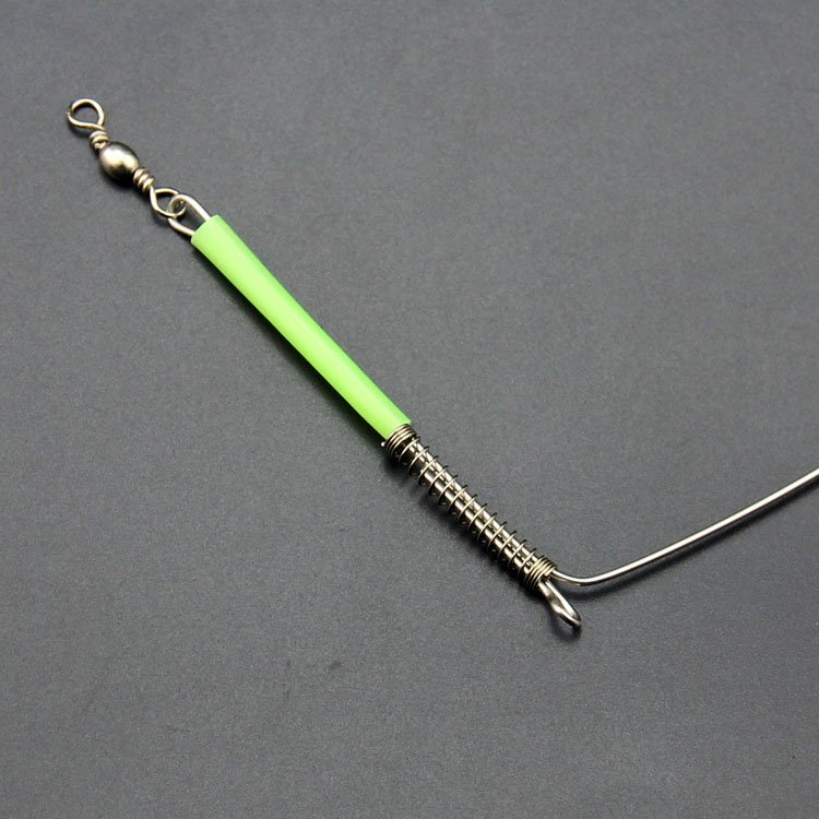 A single knife, a Machete scale, a black-headed hook, a fishing boat, a fishing gear, a piece of a hook